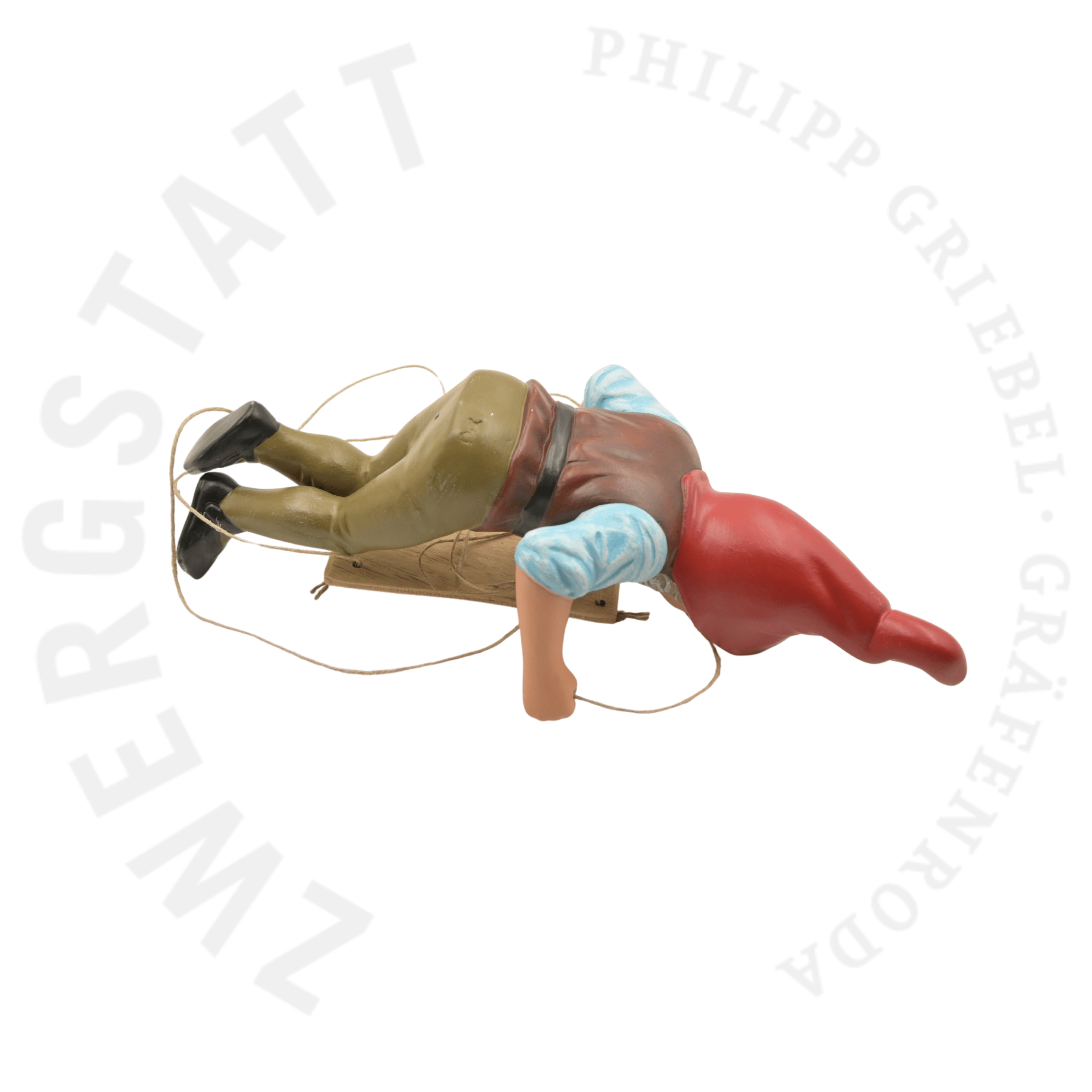 Nain de jardin Adalbert le Balancier allongé, vue arrière, figurine en céramique faite à la main