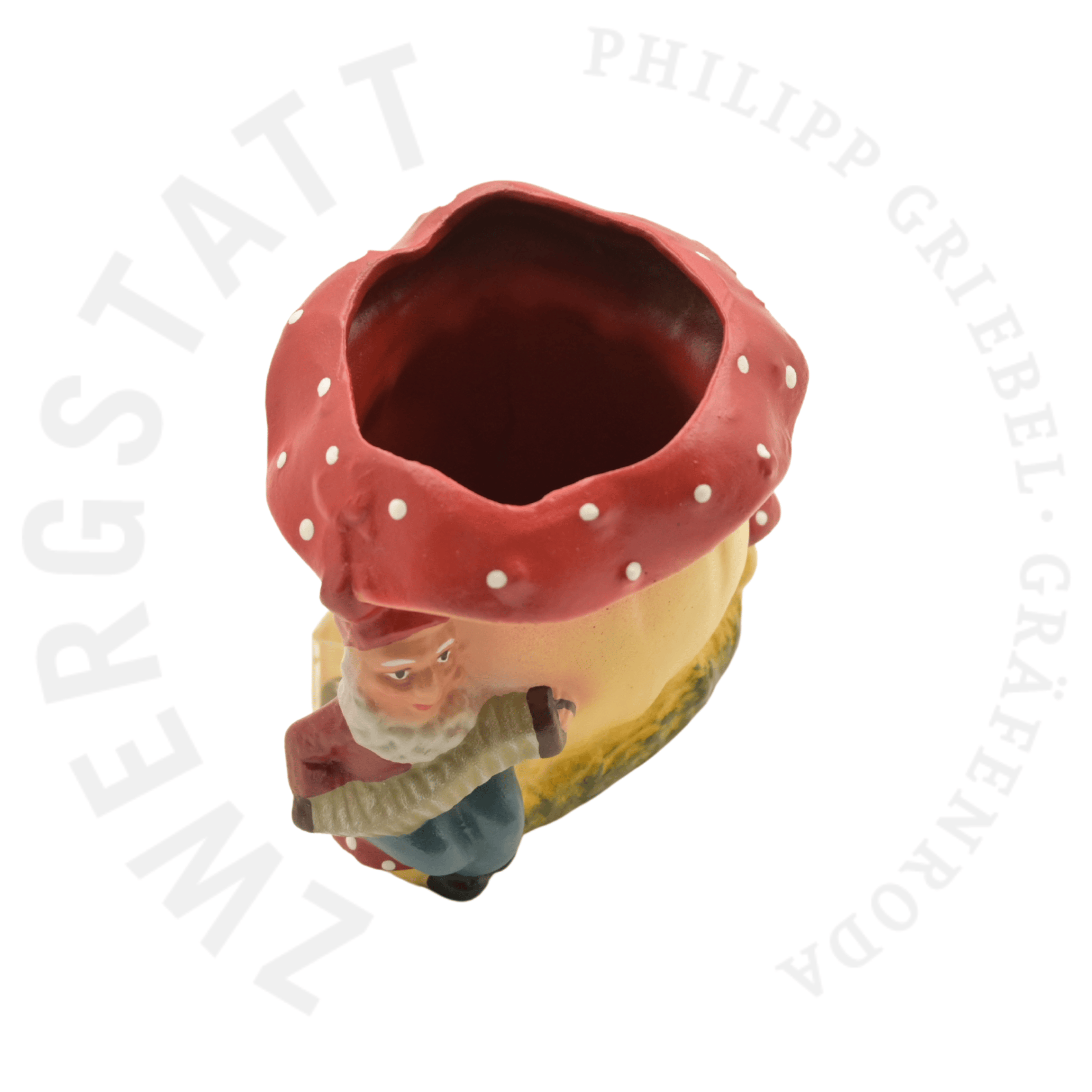 Pot de fleurs Champignon avec Nain joueur d’accordéon – vue en plongée